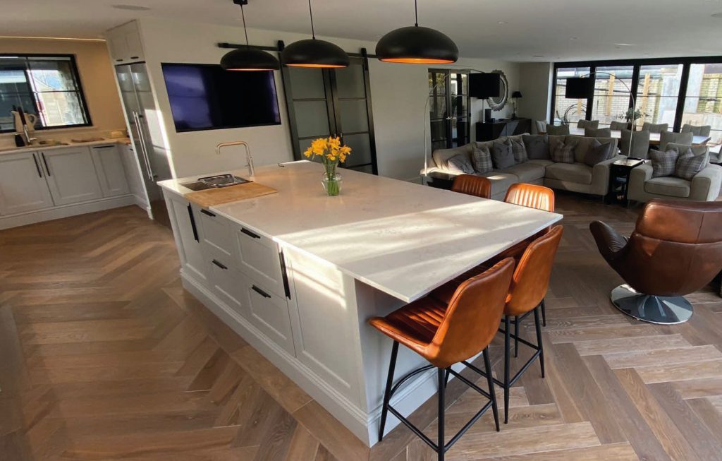 Kitchen with herringbone flooring